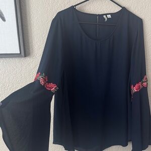 Chic Navy Blouse with Floral Accents